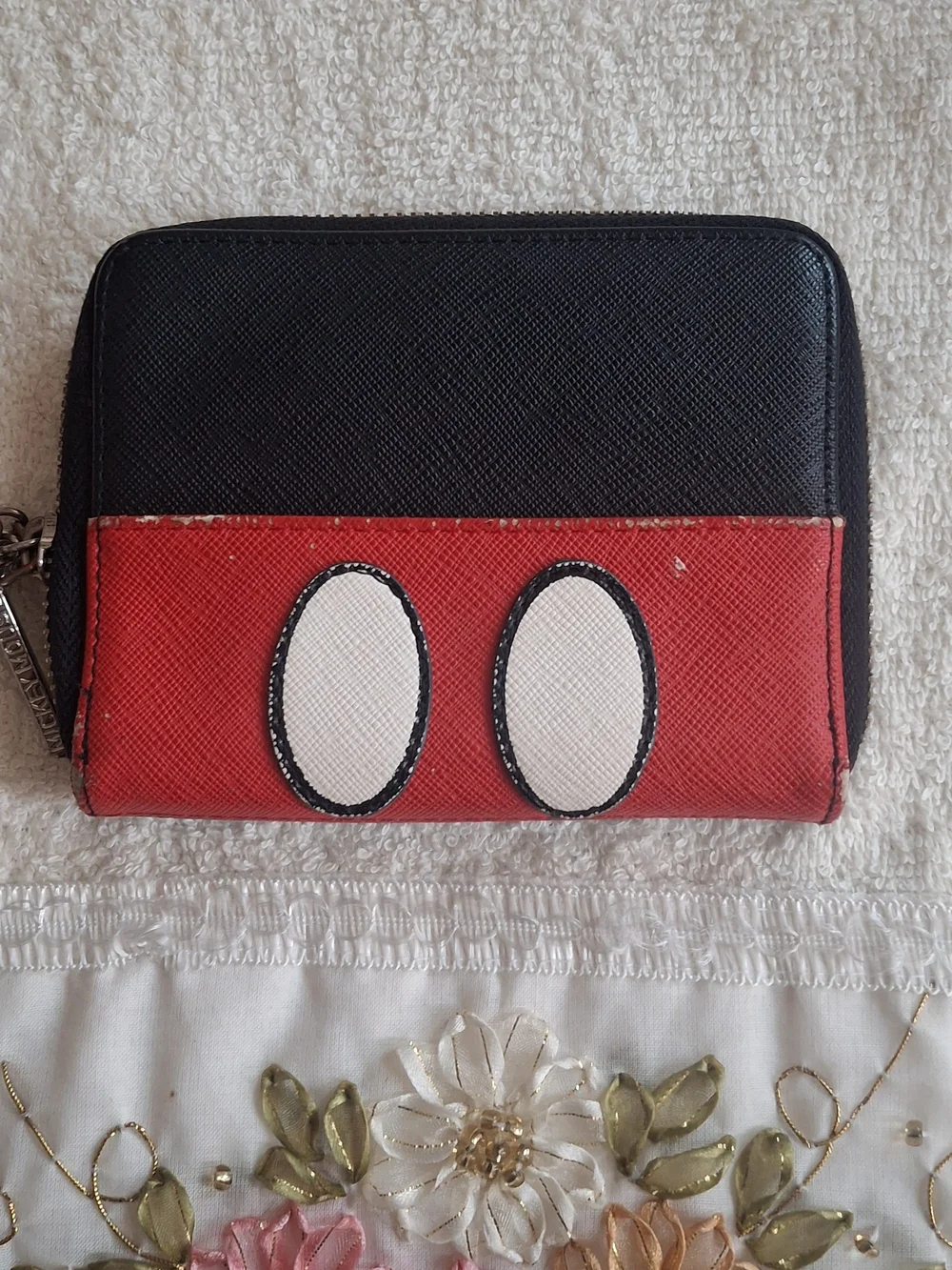 Disney Loungefly zip-around wallet featuring a white Mickey Mouse gloved hand